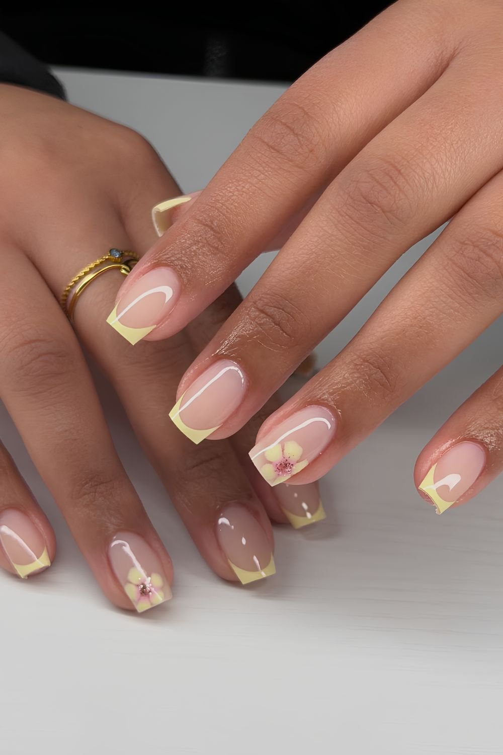 Yellow French tip nails