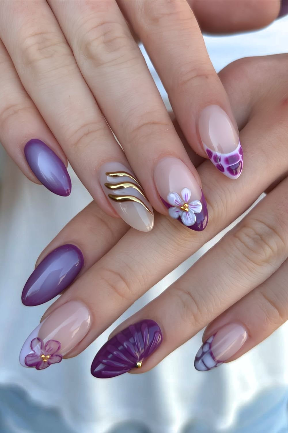 Dark purple mix and match floral mamicure