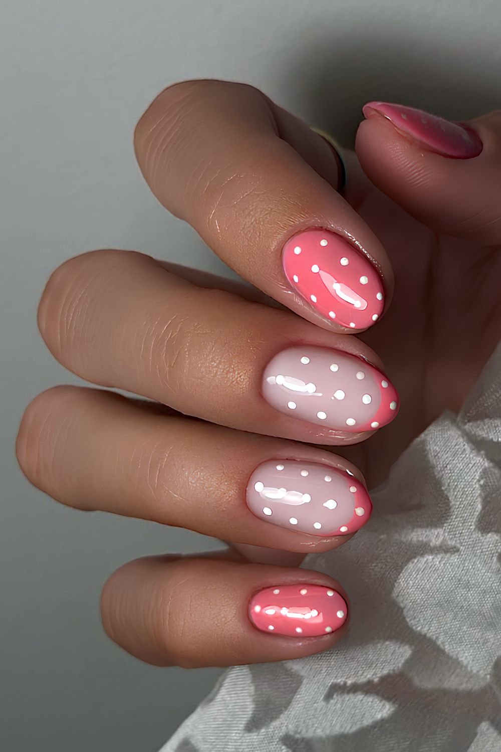 Flamingo pink and white polka dot nails