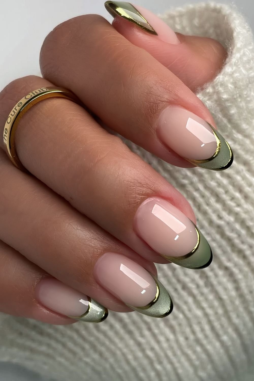 Light green cat eye double french nails with gold chrome outline