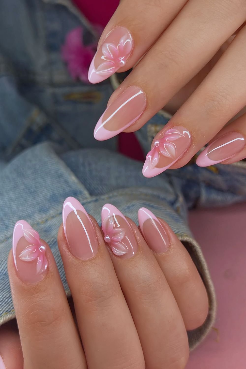 Light pink French tips with chunky 3D floral accents