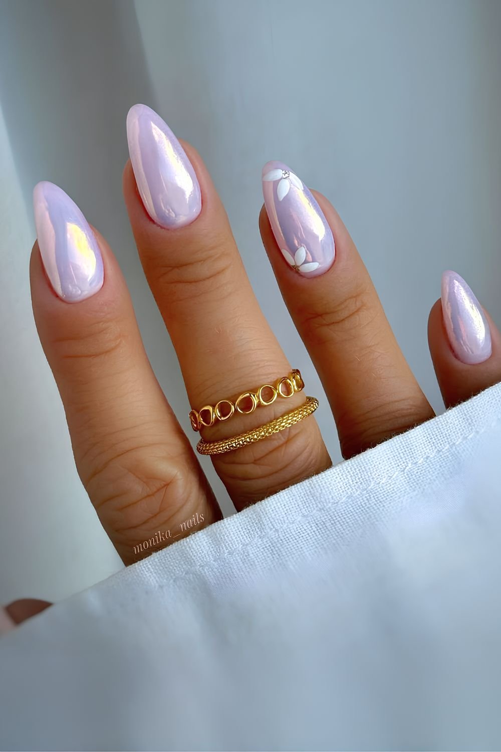Light purple chrome nails with white half-floral accents