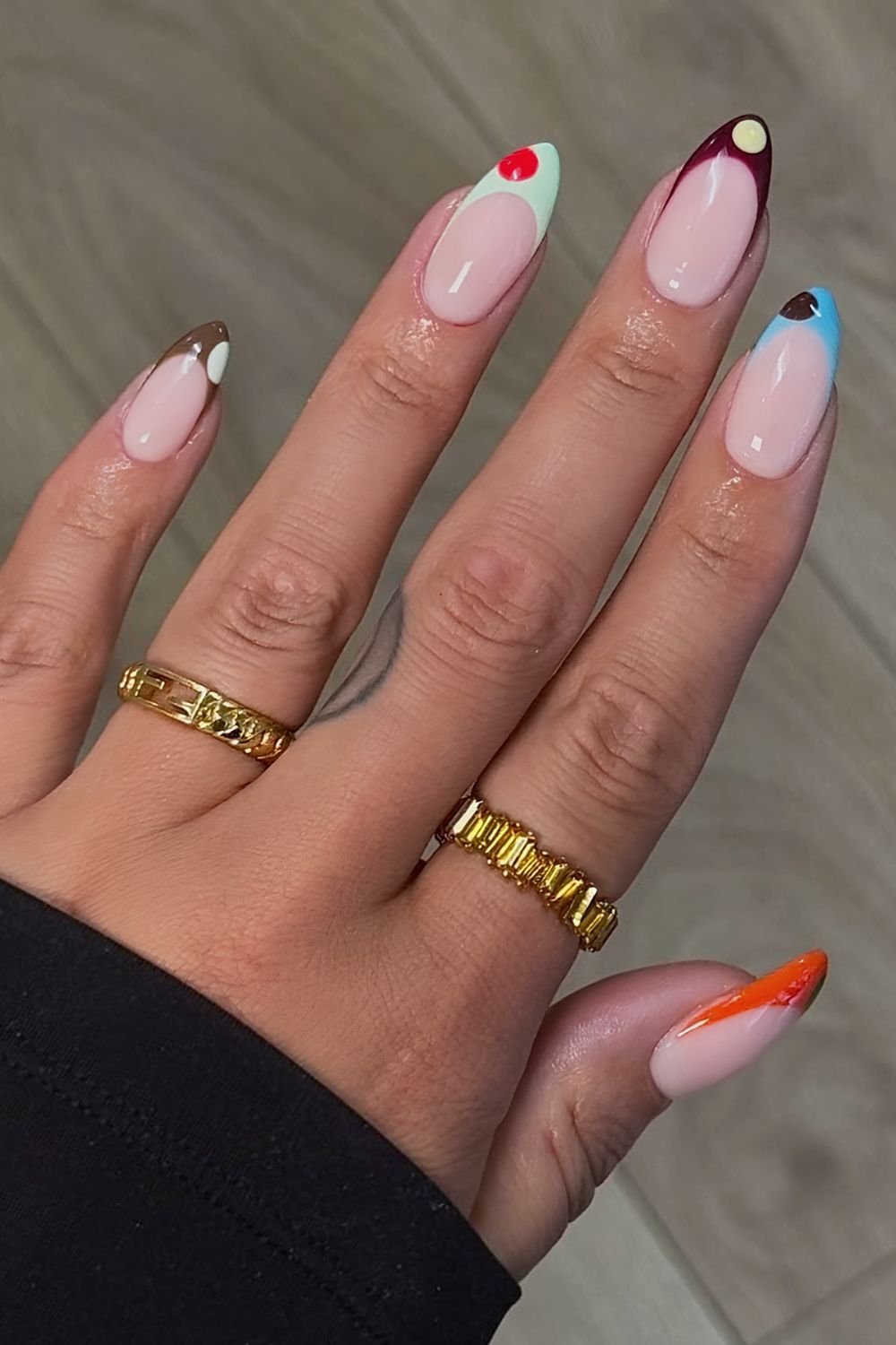 Moody colored bubble pop French tip nails