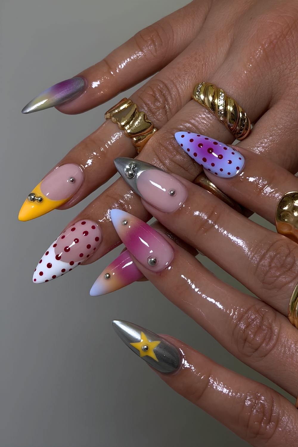 Multicolored mix and match nails with silver chrome accents
