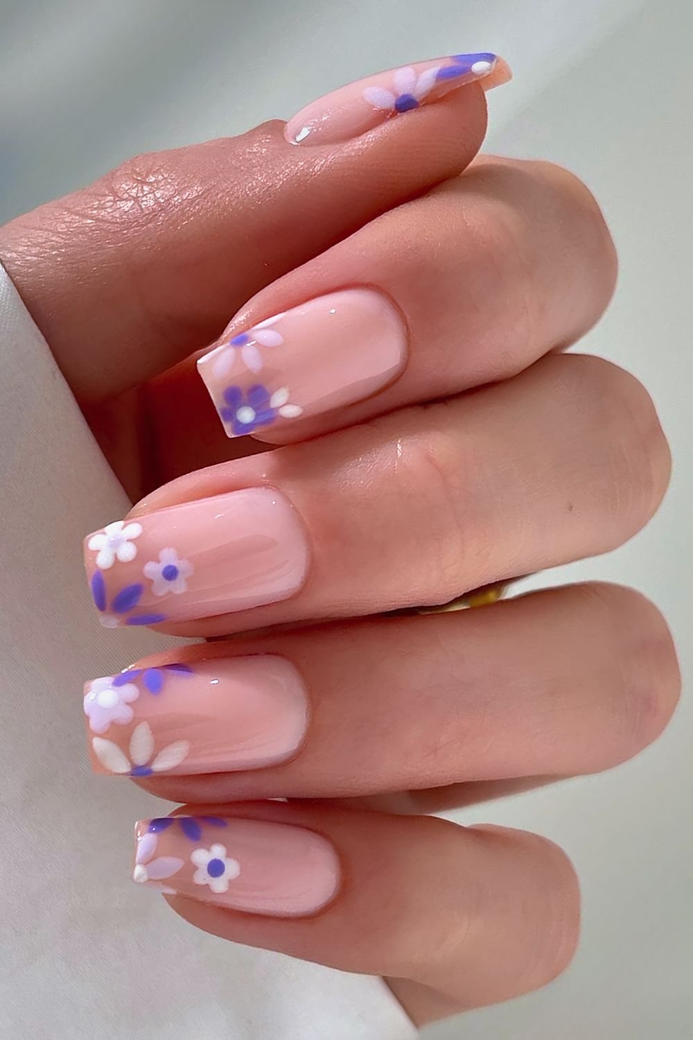 Purple floral French tip nails