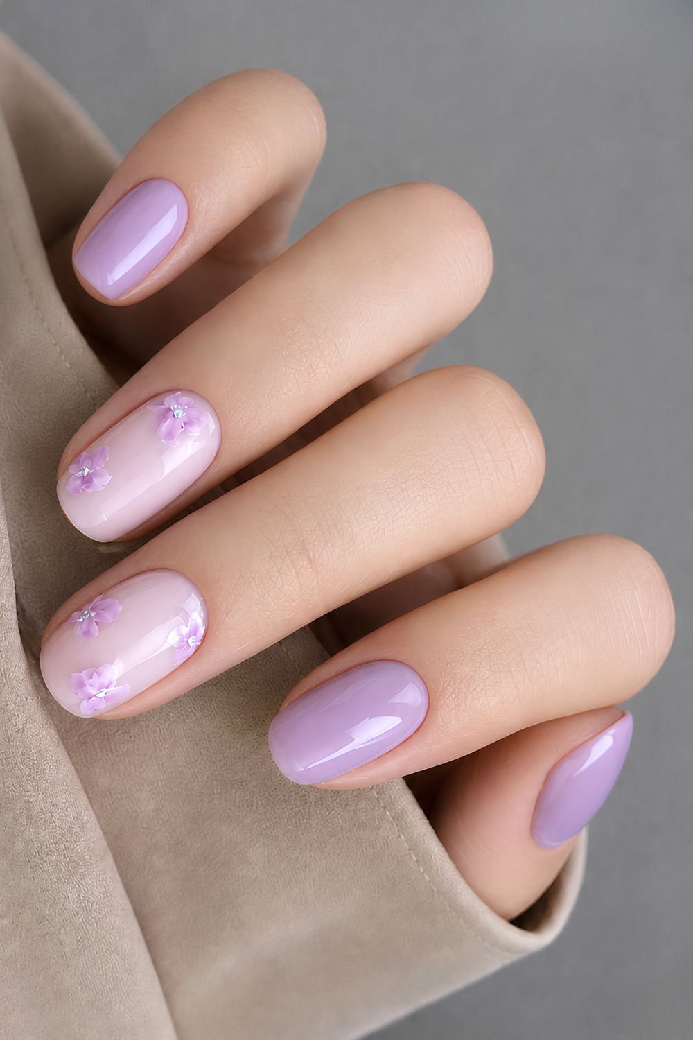 Purple nails with pink base and purple marble flower design