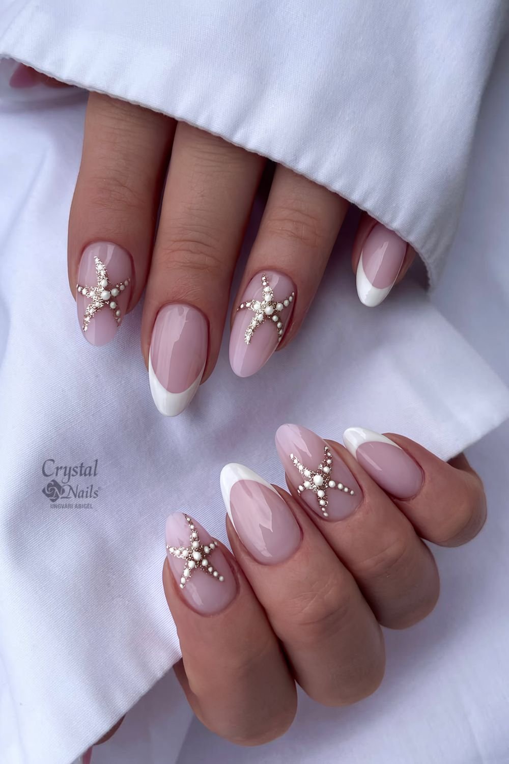 White and gold starfish nails