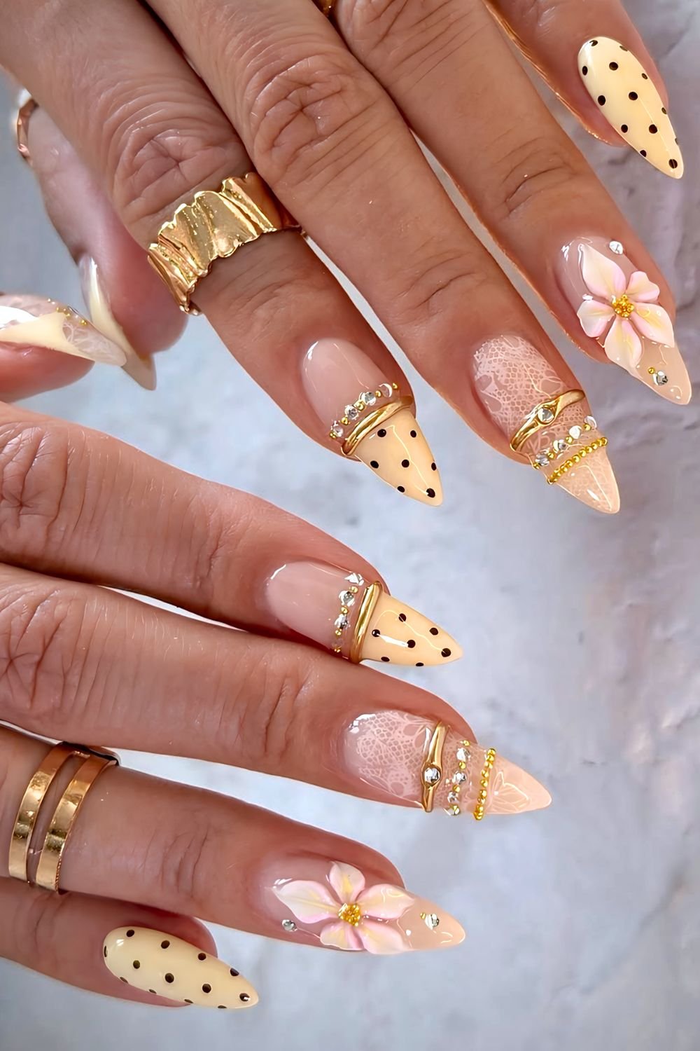 Yellow lace polka dot and bangle nails
