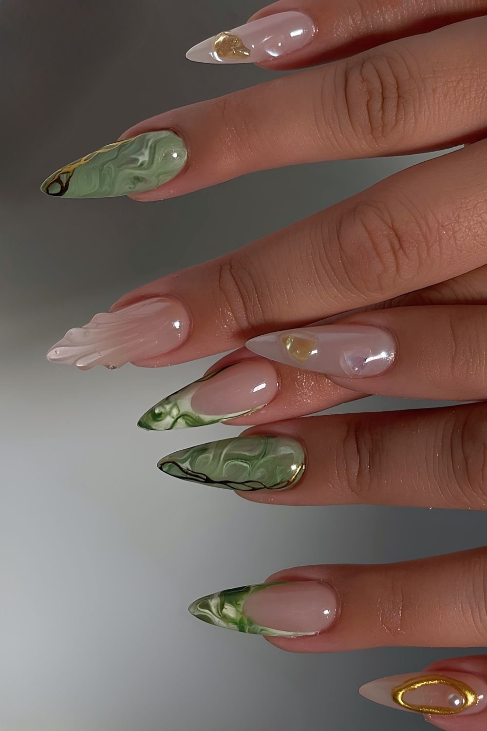 Green marble nails wit white seashell accents