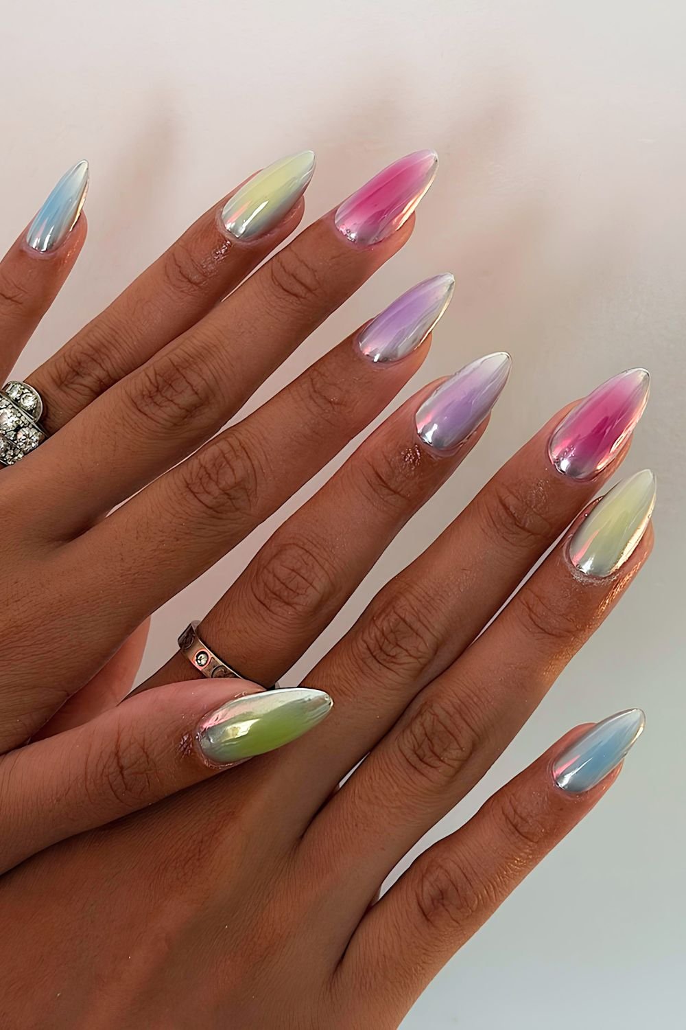 Multicolored and silver chrome aura nails