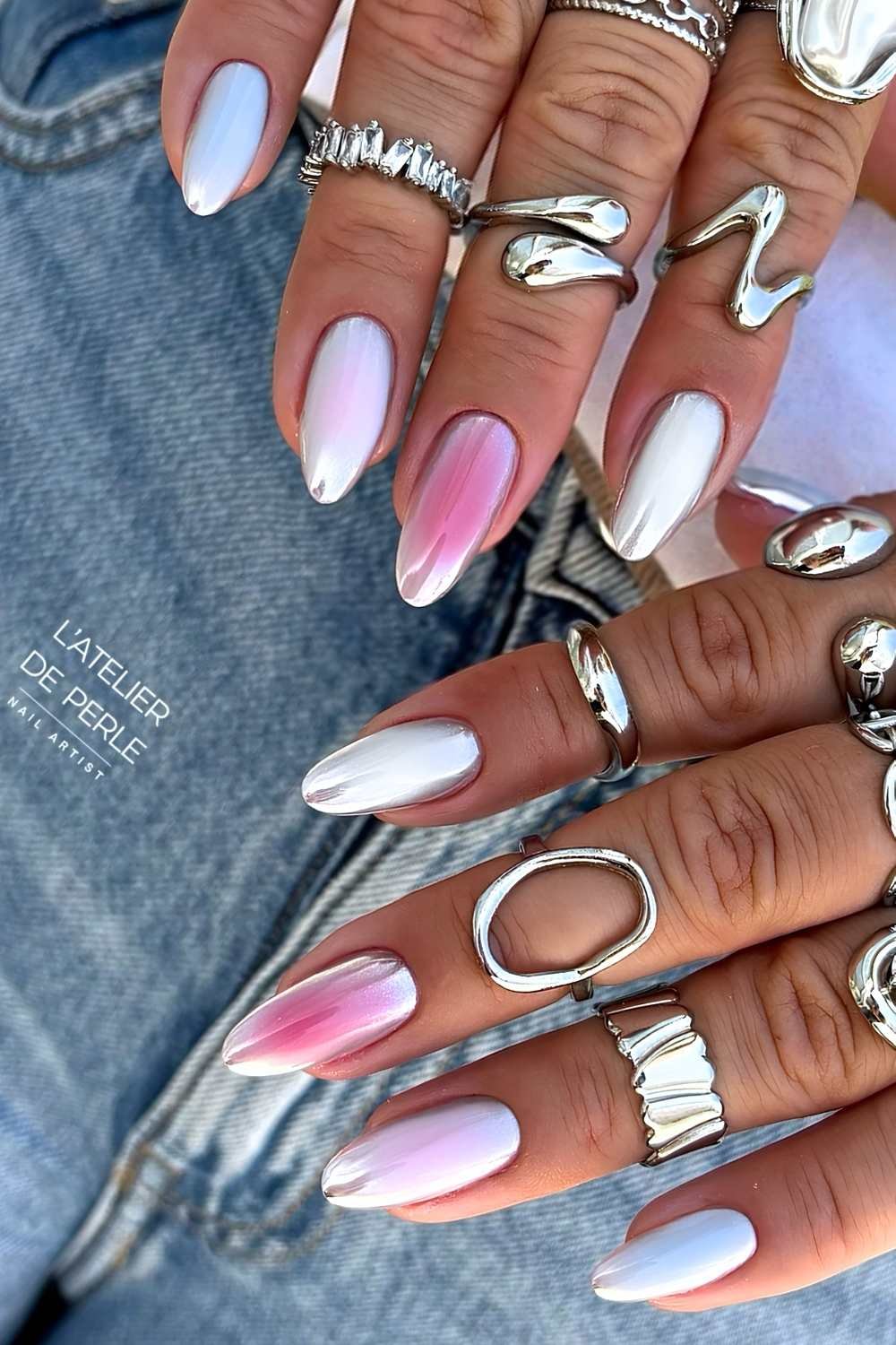 Silver chrome aura nails with white, pink and blue halos
