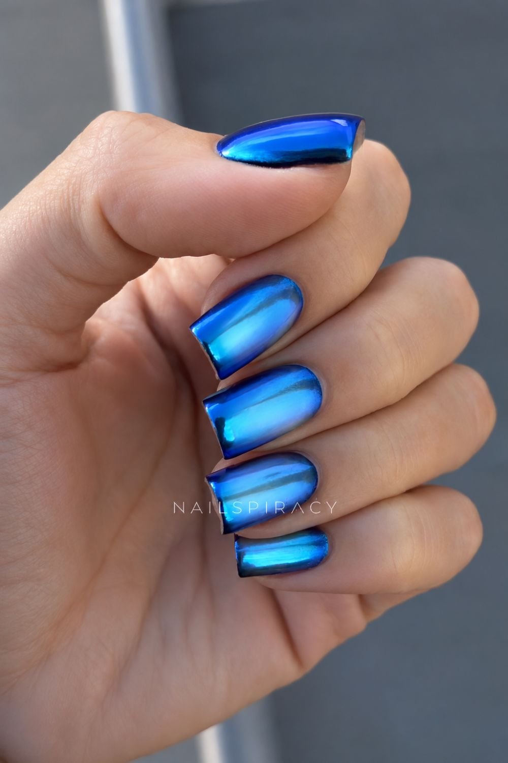 Square shaped blue chrome aura nails