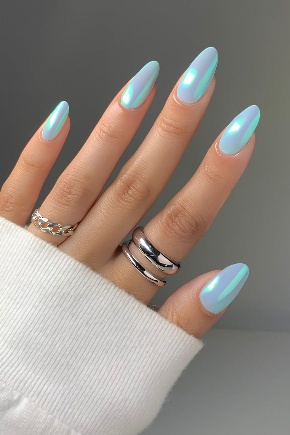 Turquoise chrome nails