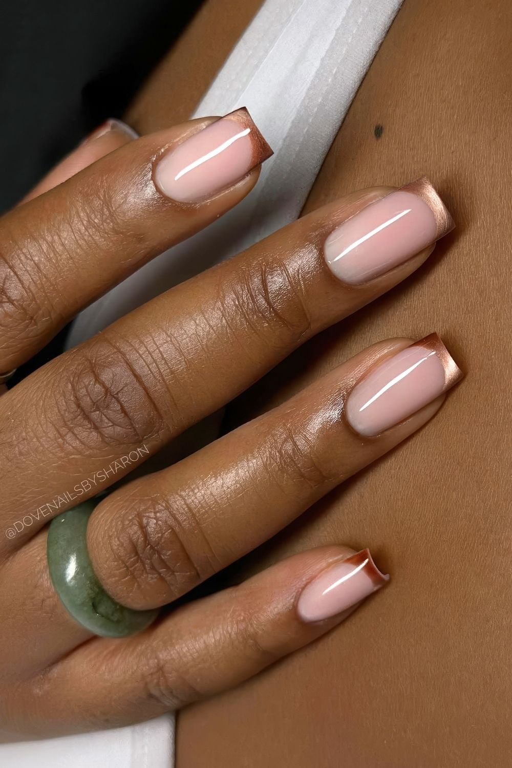 Brown cat eye French tip nails