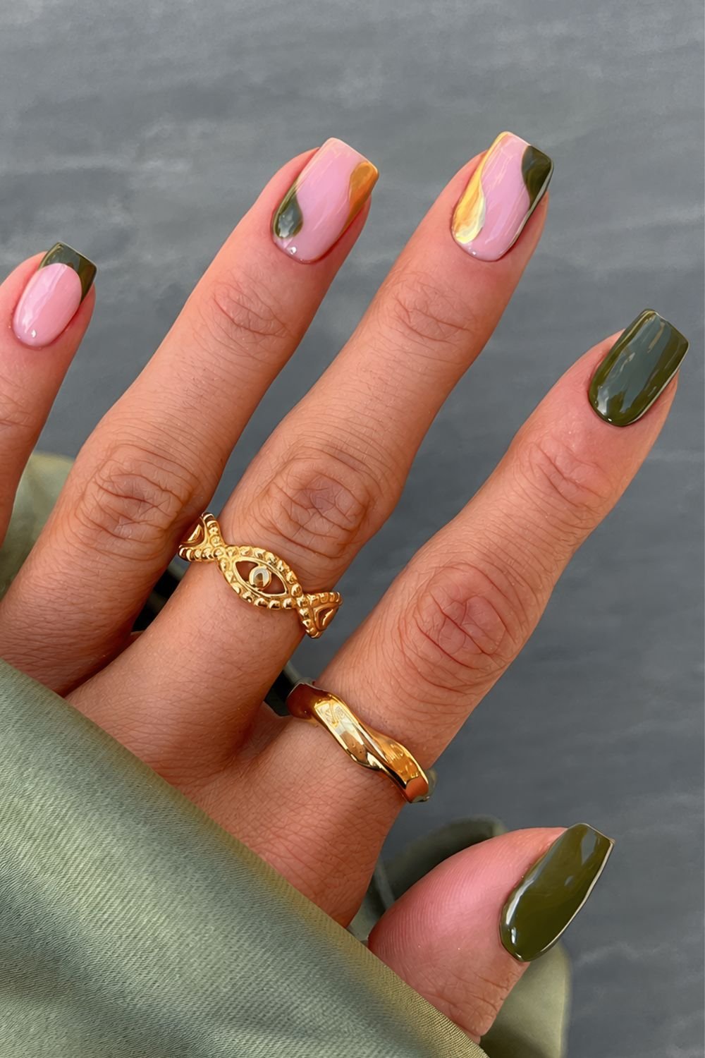 Olive green nails with green and gold accents