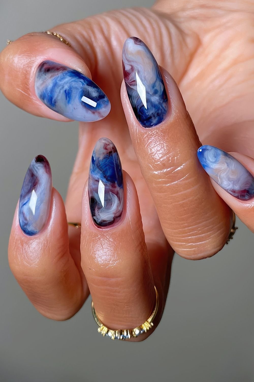 Brown and blue marble nails