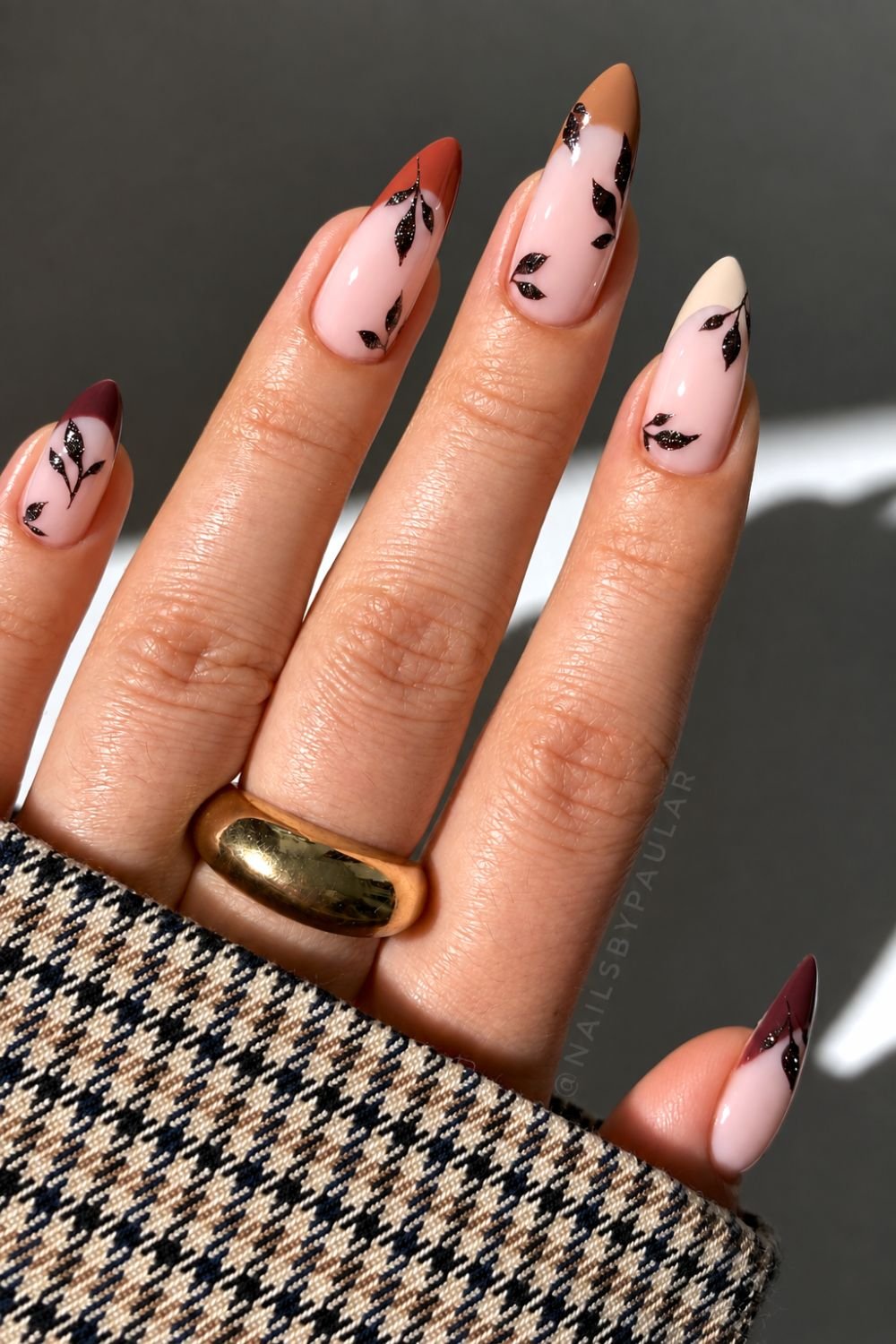 Brown gradient French nails with glittery bronze leaf design