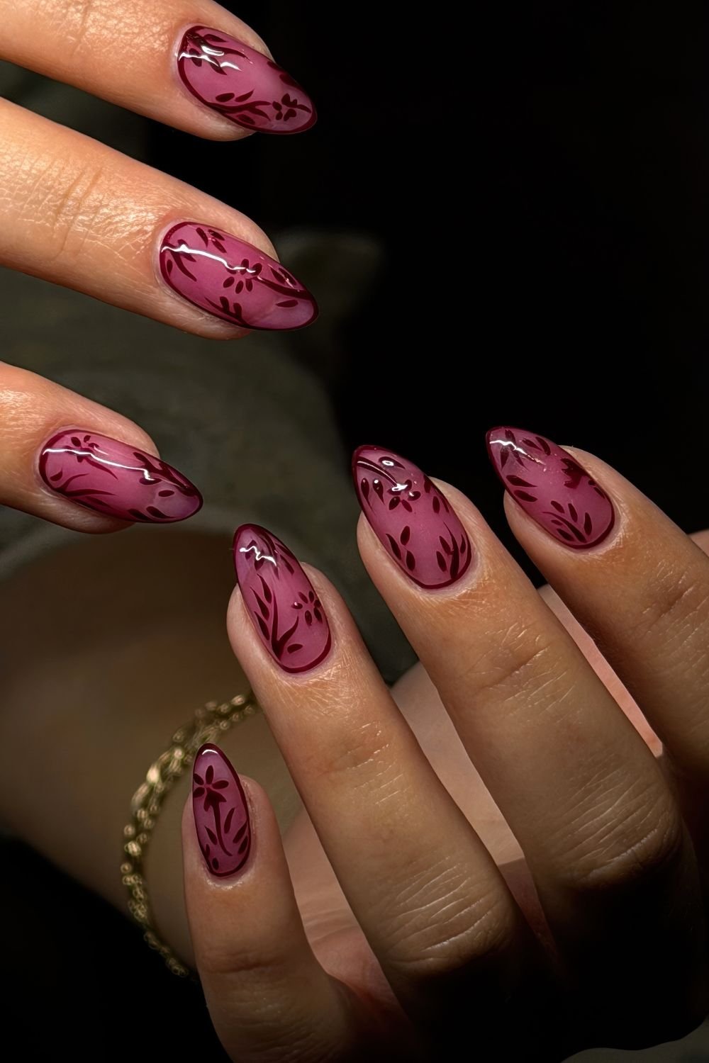 Burgundy jelly nails with leaf design