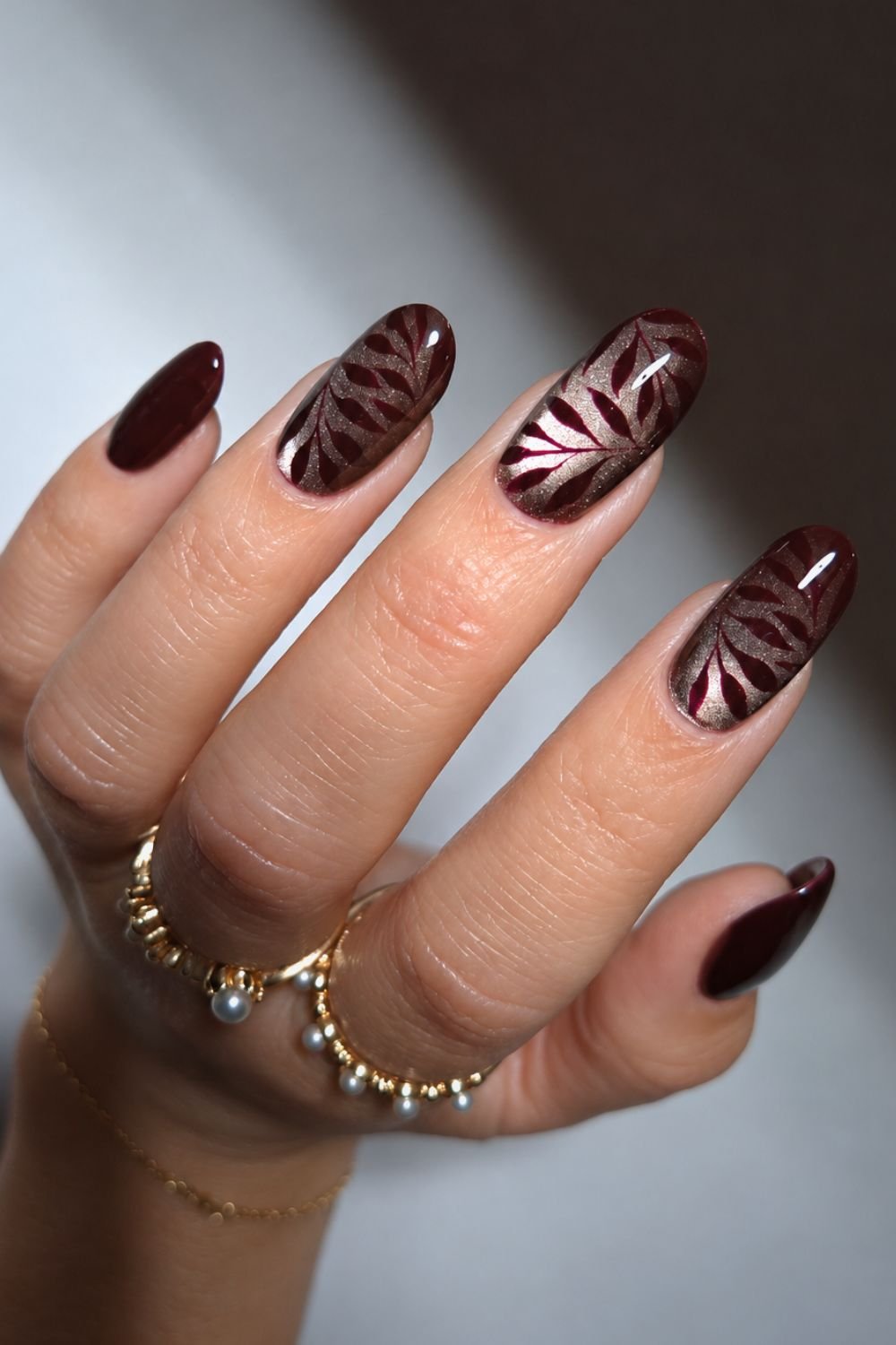 Mocha browncat eye effect nails with dark burgundy art