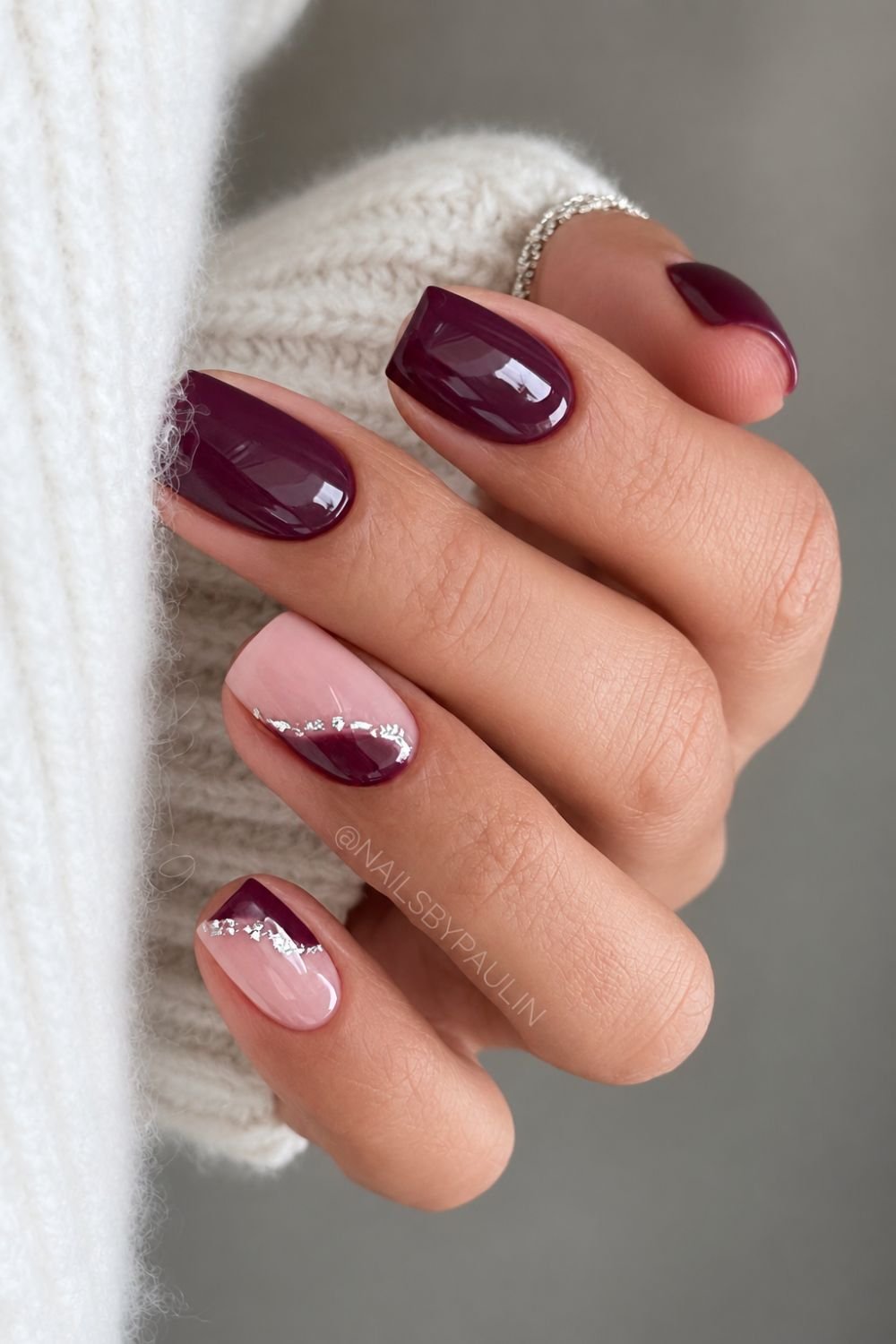 Short plum nails with silver foil accents
